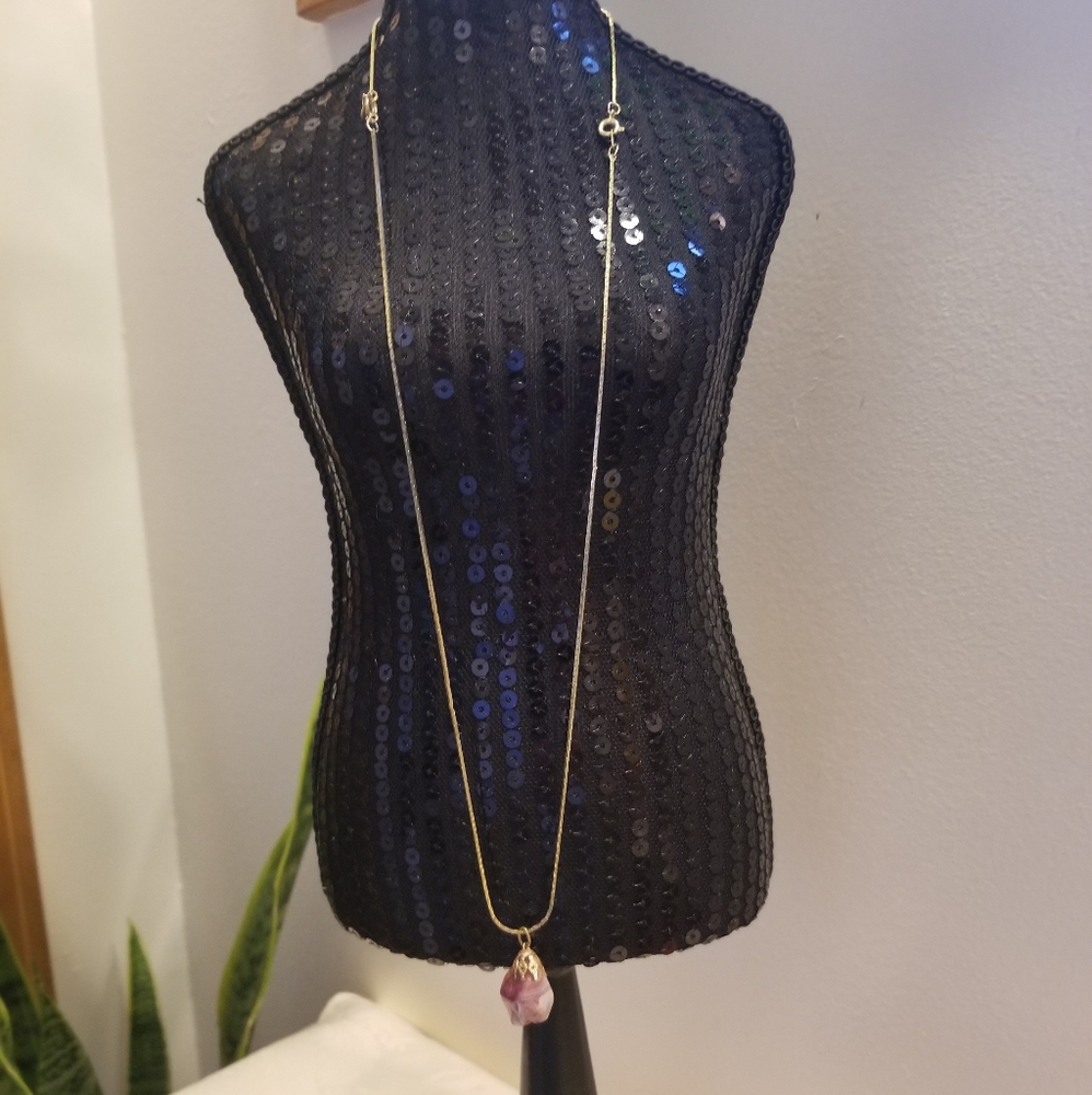 Necklace with pink stone pendant